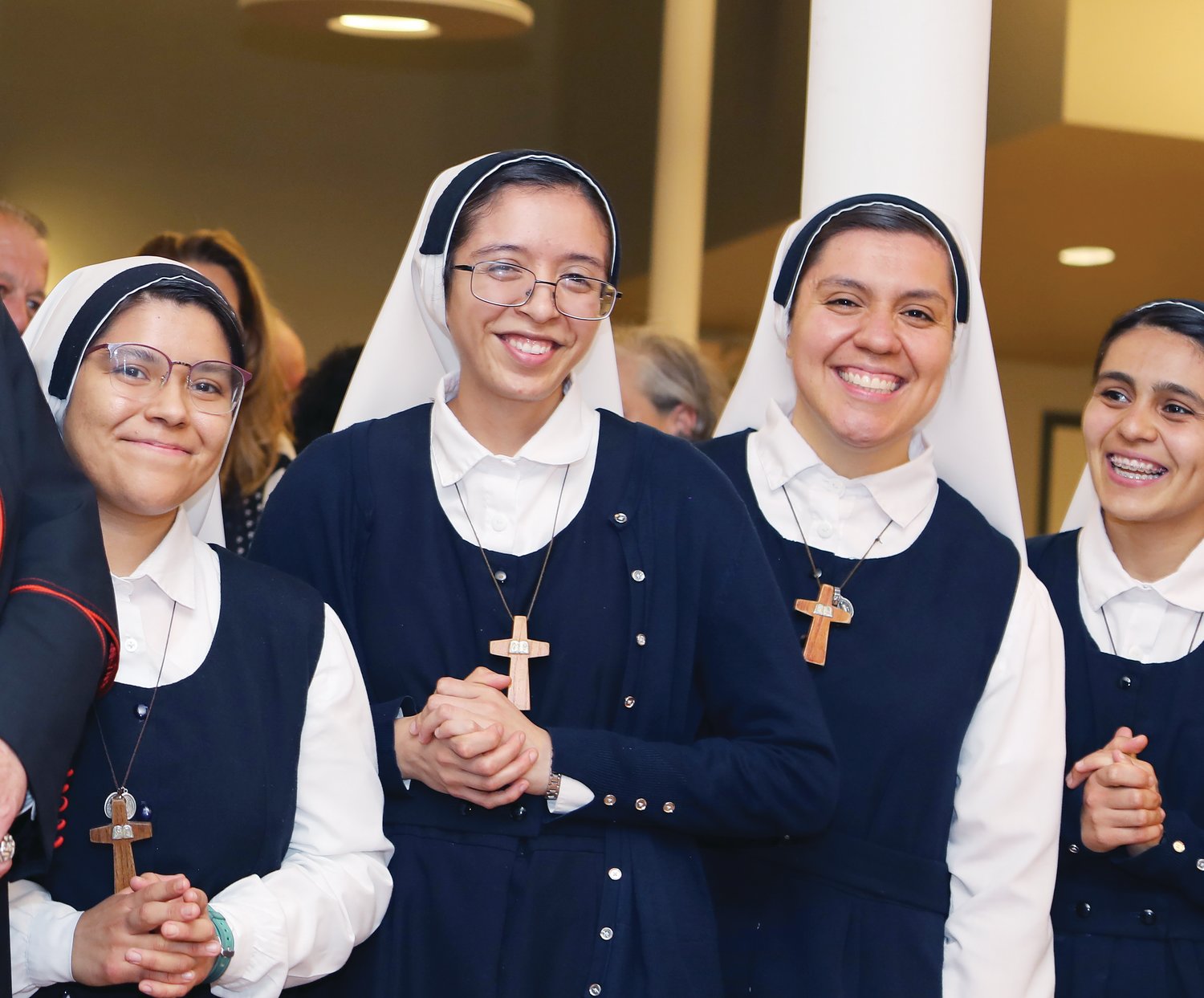 Missionary Sisters Servants of the Word (HMSP) smile at the Cathedral of SS. Peter and Paul, Providence.